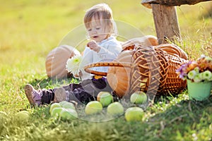 Child with pumpkins