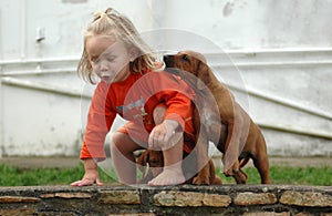 Child and puppy pet photo