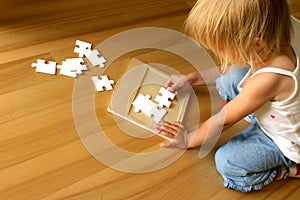 Child and puzzle