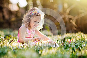 Child with rabbit. Easter bunny. Kids and pets