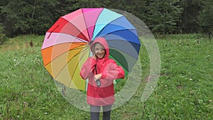 Child in Rain, Kid Playing Outdoor in Park Girl Spinning Umbrella on Raining Day