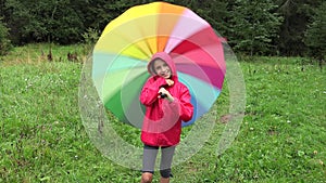 Child in Rain, Kid Playing Outdoor in Park Girl Spinning Umbrella on Raining Day