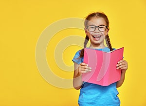 Child is reading a book