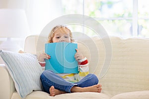 Child reading book. Kids read books