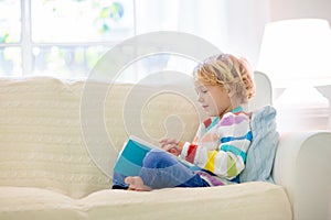 Child reading book. Kids read books