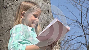 Child Reading in Tree Park, Schoolgirl Reads Book Outdoor in Nature, Educative