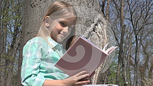 Child Reading in Tree Park, Schoolgirl Reads Book Outdoor in Nature, Educative