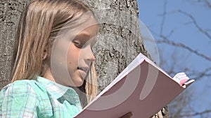 Child Reading in Tree Park, Schoolgirl Reads Book Outdoor in Nature, Educative