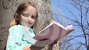 Child Reading in Tree Park, Schoolgirl Reads Book Outdoor in Nature, Educative