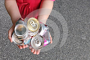 Child Recycling Aluminum Cans