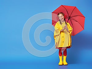 Child with red umbrella