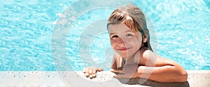Child relax in summer swimming pool. Little boy playing in outdoor swimming pool in water on summer vacation. Banner for
