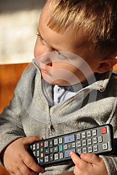 Child with remote control