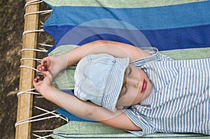 Child resting in hammock