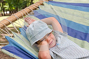 Child resting in hammock