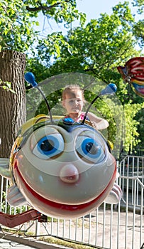 Child rides in an amusement park. children attractions