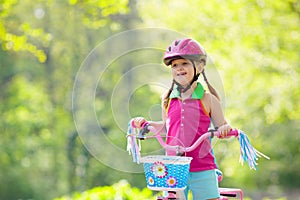 Child riding bike. Kid on bicycle