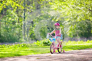 Child riding bike. Kid on bicycle