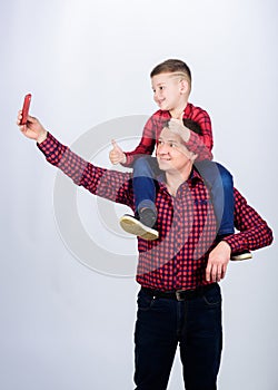 Child riding on dads shoulders. Happiness being father of boy. Having fun. Fathers day. Father example of noble human