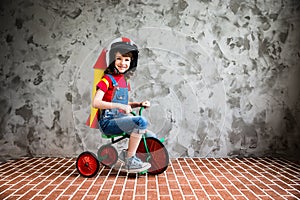 Child riding a retro bicycle