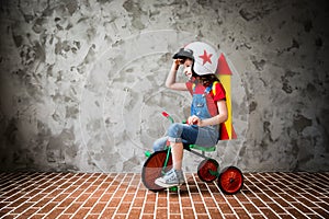 Child riding a retro bicycle