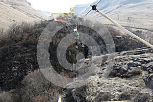 Child riding on zip line