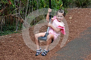 Child rids on Flying Fox