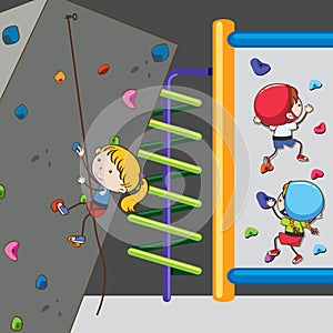 Child rockclimbing on wall