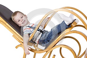 Child on a rocking chair