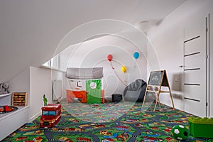 Child room with carpet playmate