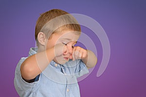 Child Rubbing Eyes photo