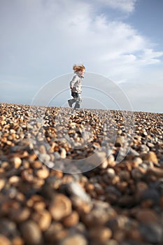 Child running beach freedom