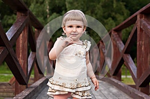 Child running on the bridge