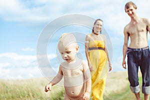 Child running in a field