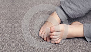 Child`s bare feet. Heel and foot. Toes