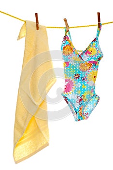 Child's bathing suit beach towel on clothes line