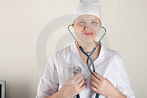 The child`s doctor is preparing to receive patients in his office. Happy children are very fond of a good pediatrician. Close up