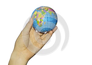 Child's hand and globe