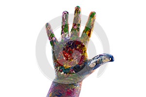 Child's hand is painted watercolors on white background