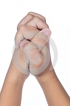 Child`s hands folded together in prayer