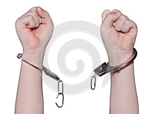 child's hands with the torn handcuffs photo