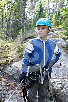 Child with safety climbing equipment