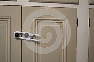 A child safety lock with copy space to the right