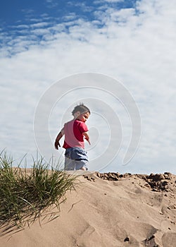 Child on sand dune