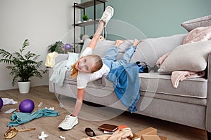 The child scattered things in the room