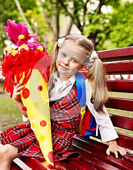 Child with school cone.