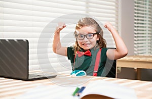Child schoolboy pupil learn english online at home school. Homeschooling and distance education for kids.
