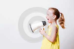 Child screams into a megaphone