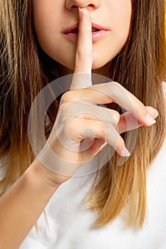 Child secret hush gesture keep quiet girl shhh