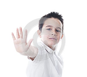 Child showing stop gesture.